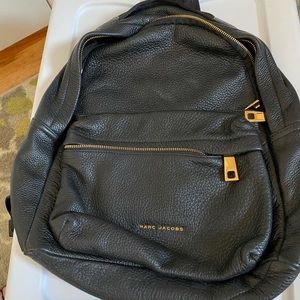 Marc Jacobs black leather backpack.